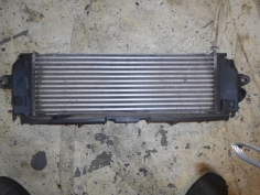 Piece-Echangeur-air-(Intercooler)--ae71f63b9943c0eeefc3e10bd0f6c0903c14e6be85b751e81ca97d34833d75c0.JPG